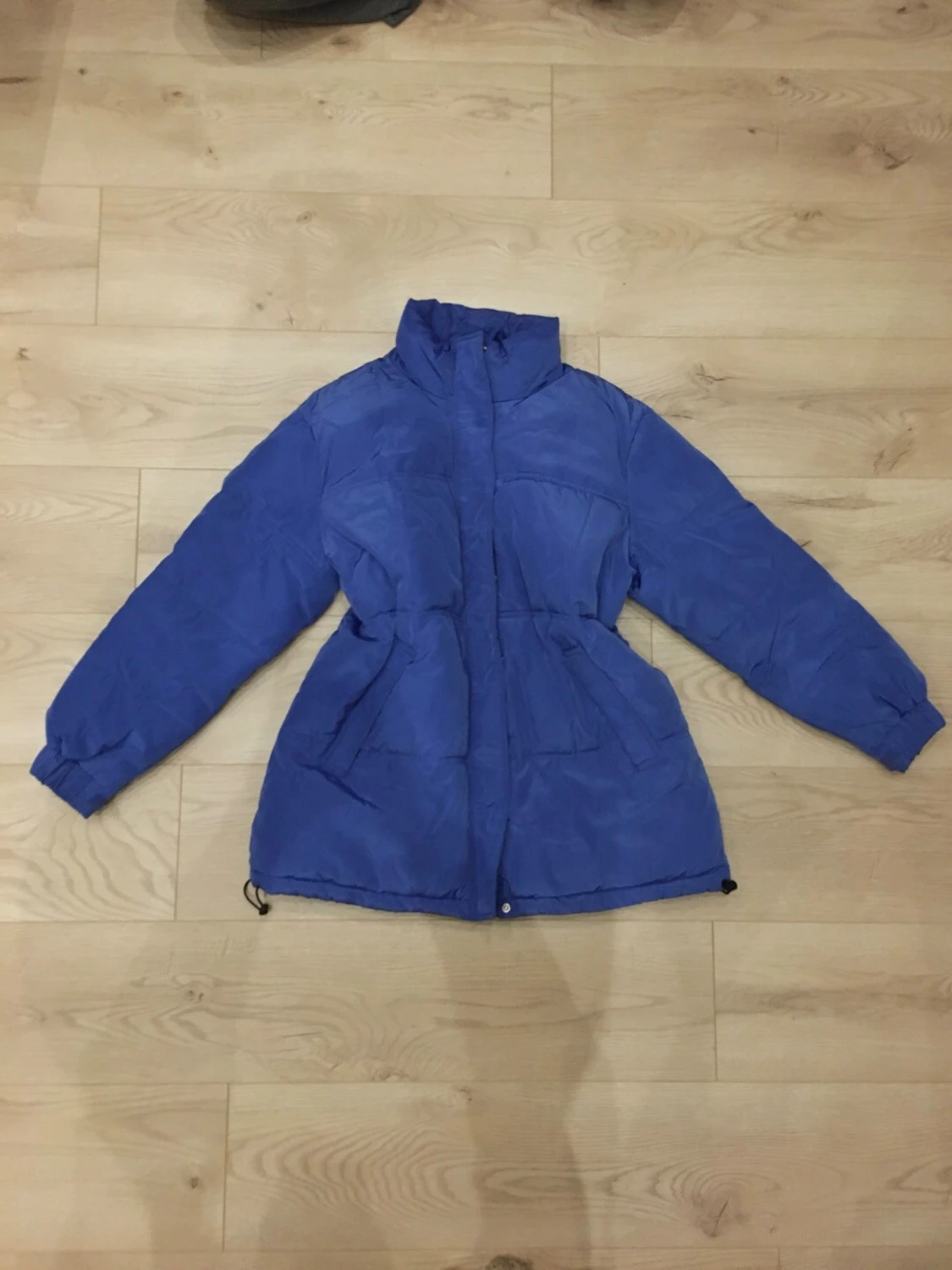 Blå puffjacka med hög krage - 1
