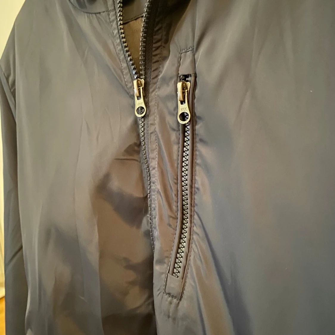 Blå vindjacka Stone Island med huva - 1