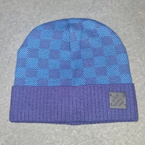 Blå rutig mössa - Mössan är helt ny och aldrig använt 