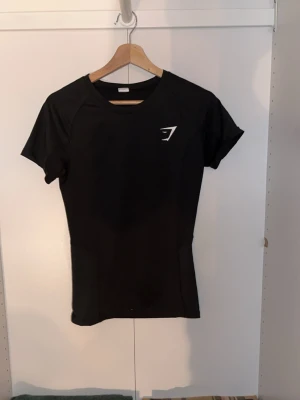 Gymshark compression shirt  - Aldrig använd fick i julklapp men gymmar inte längre