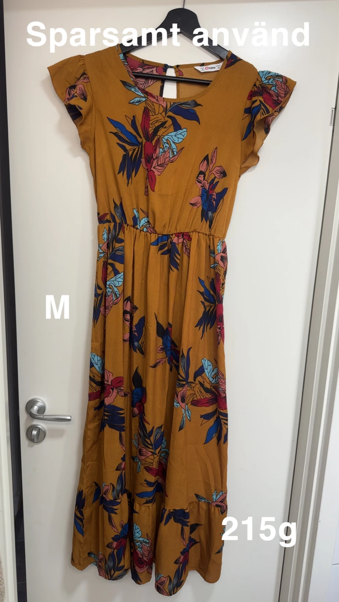 Senapsgul blommig långklänning M