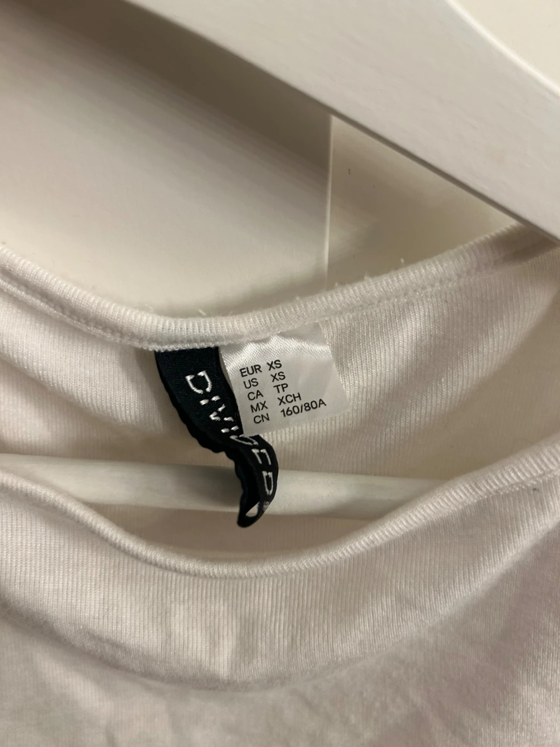 Vit omlott linnetopp från Divided XS - 1