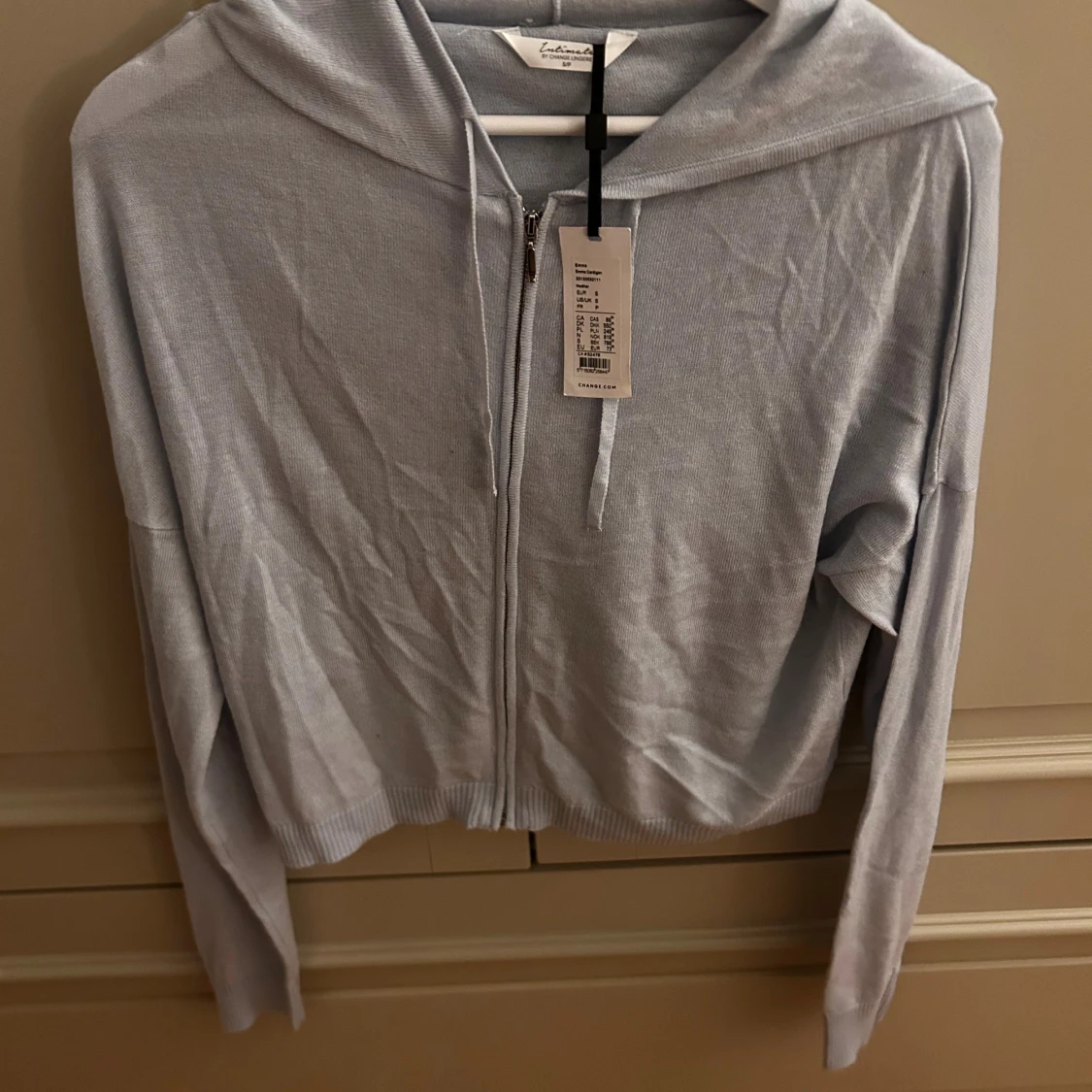 Ljusblå kofta från Intimate by Change