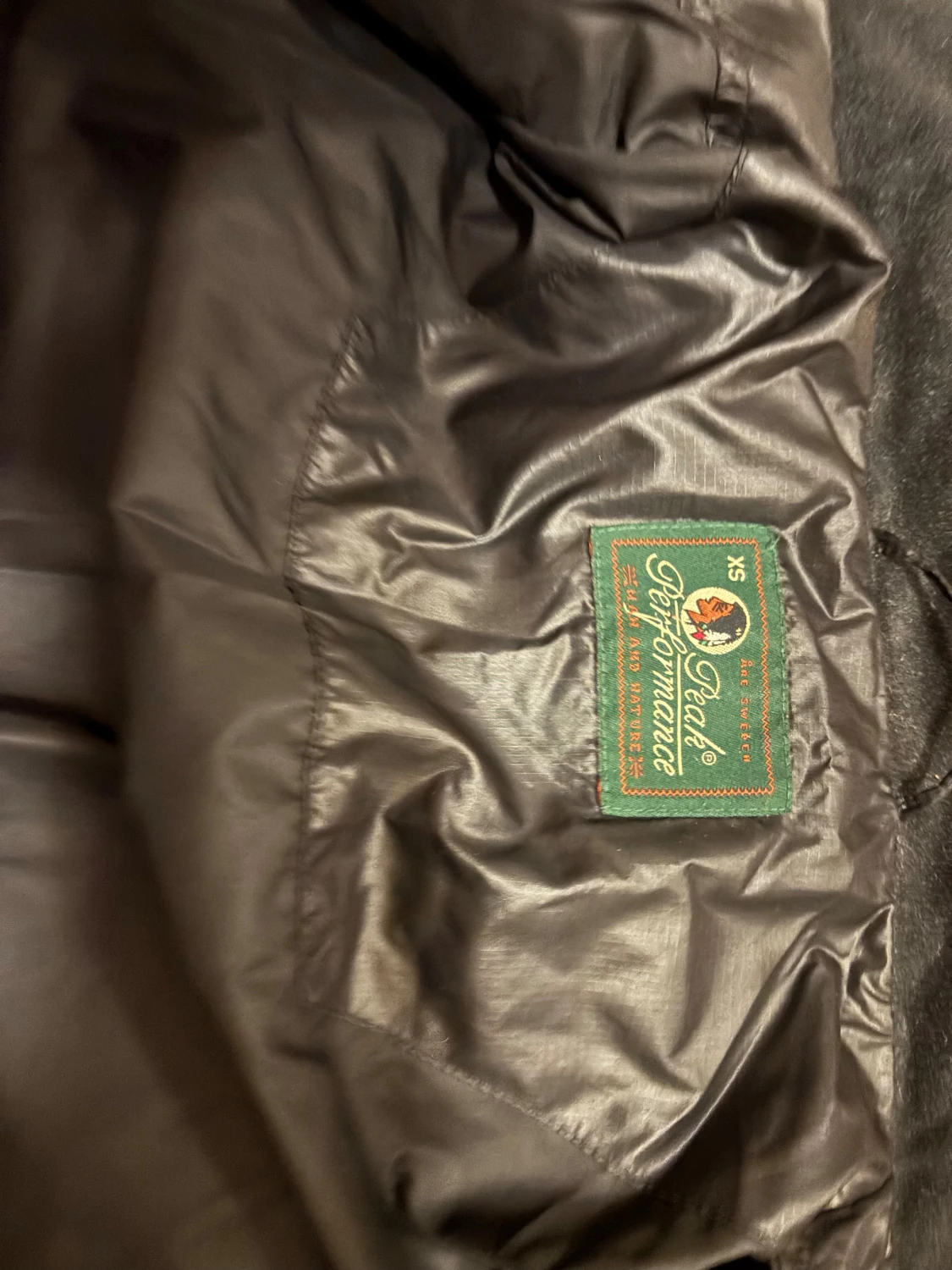 Svart pufferjacka från Peak Performance XS - 1