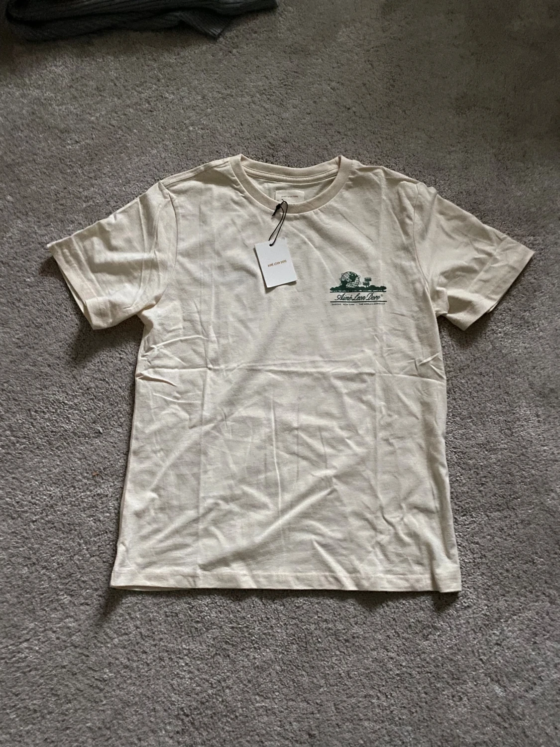 Aimé Leon Dore creme t-shirt med tryck