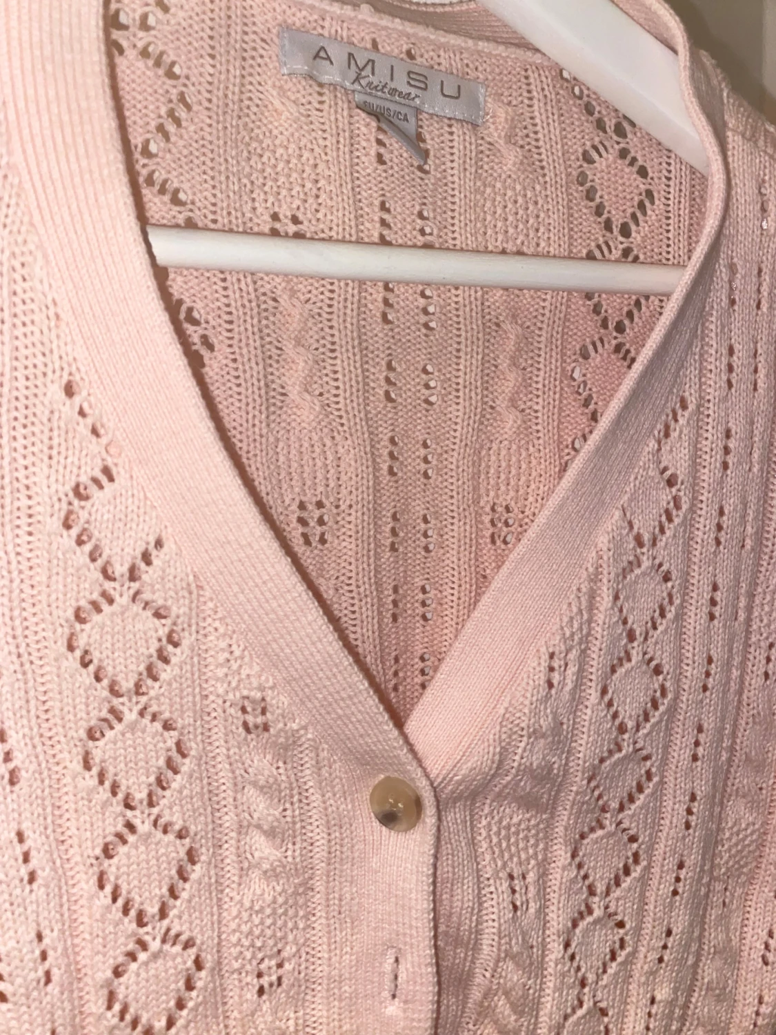 Ljusrosa virkad kofta - 1