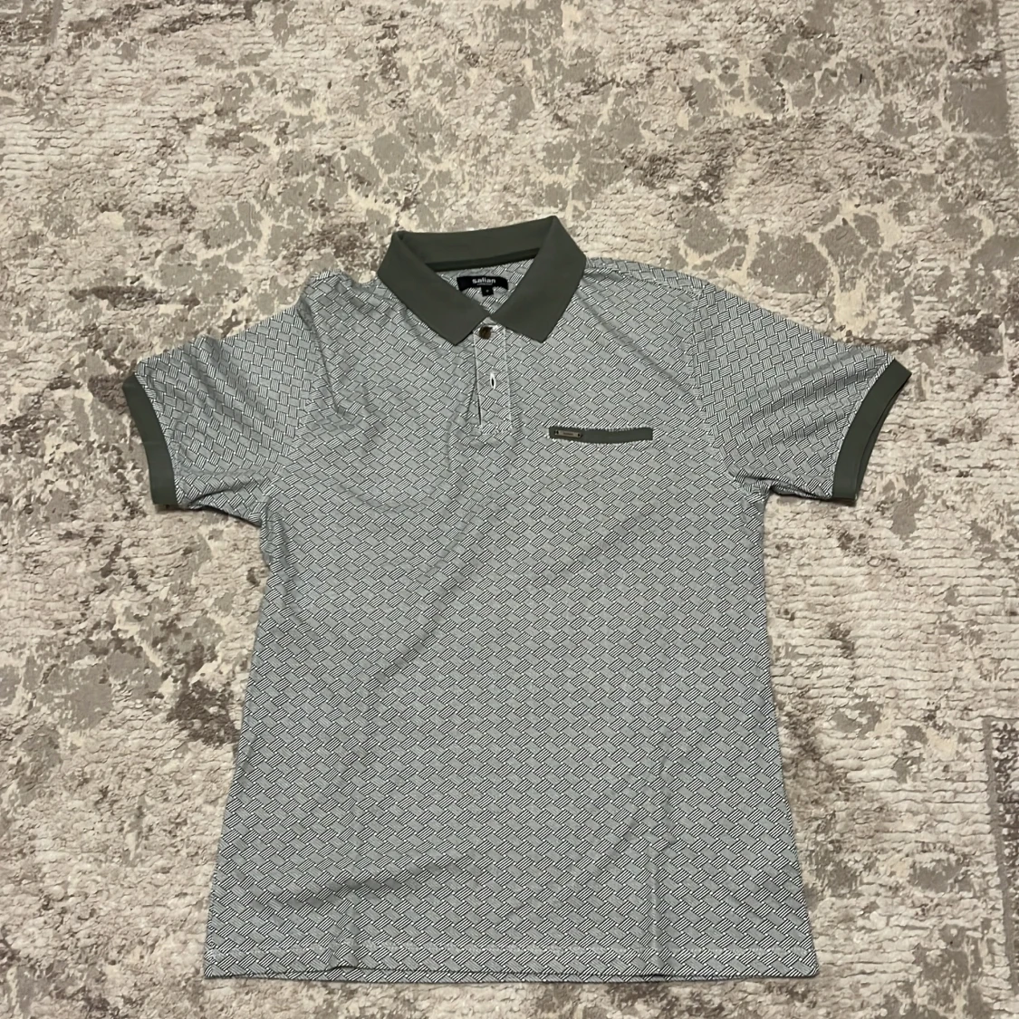 Gråmönstrad piké från Salian