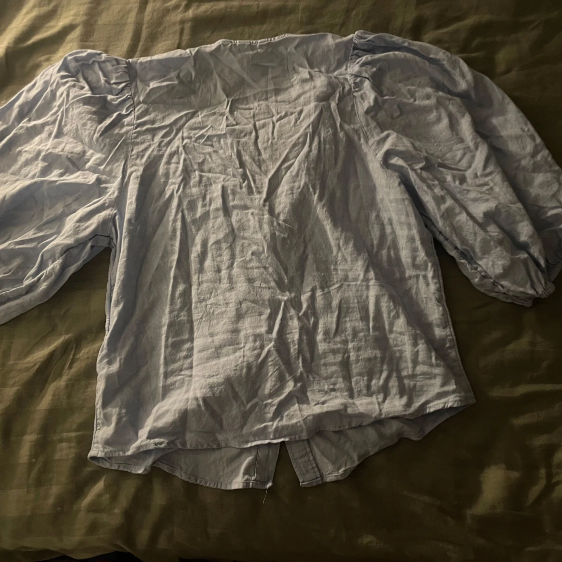 Ljusblå blus med puffärm från H&M