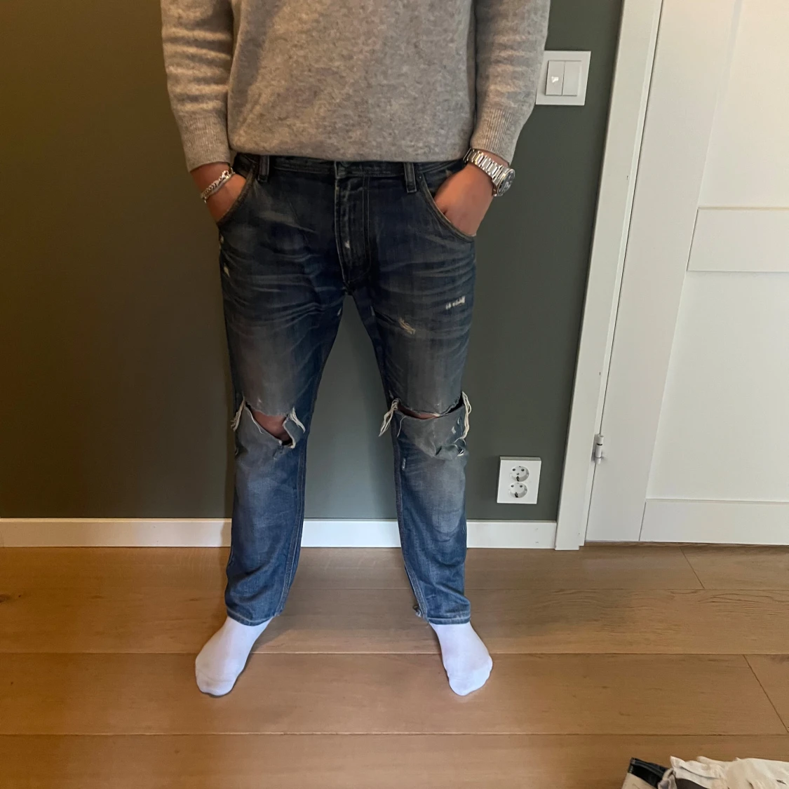 Blå slitna jeans från Diesel