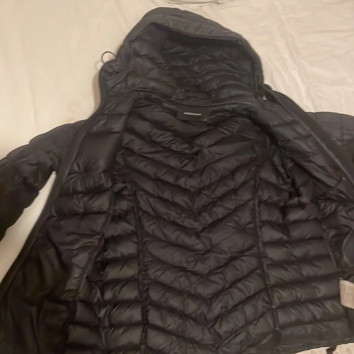 Svart dunjacka Peak Performance - 3