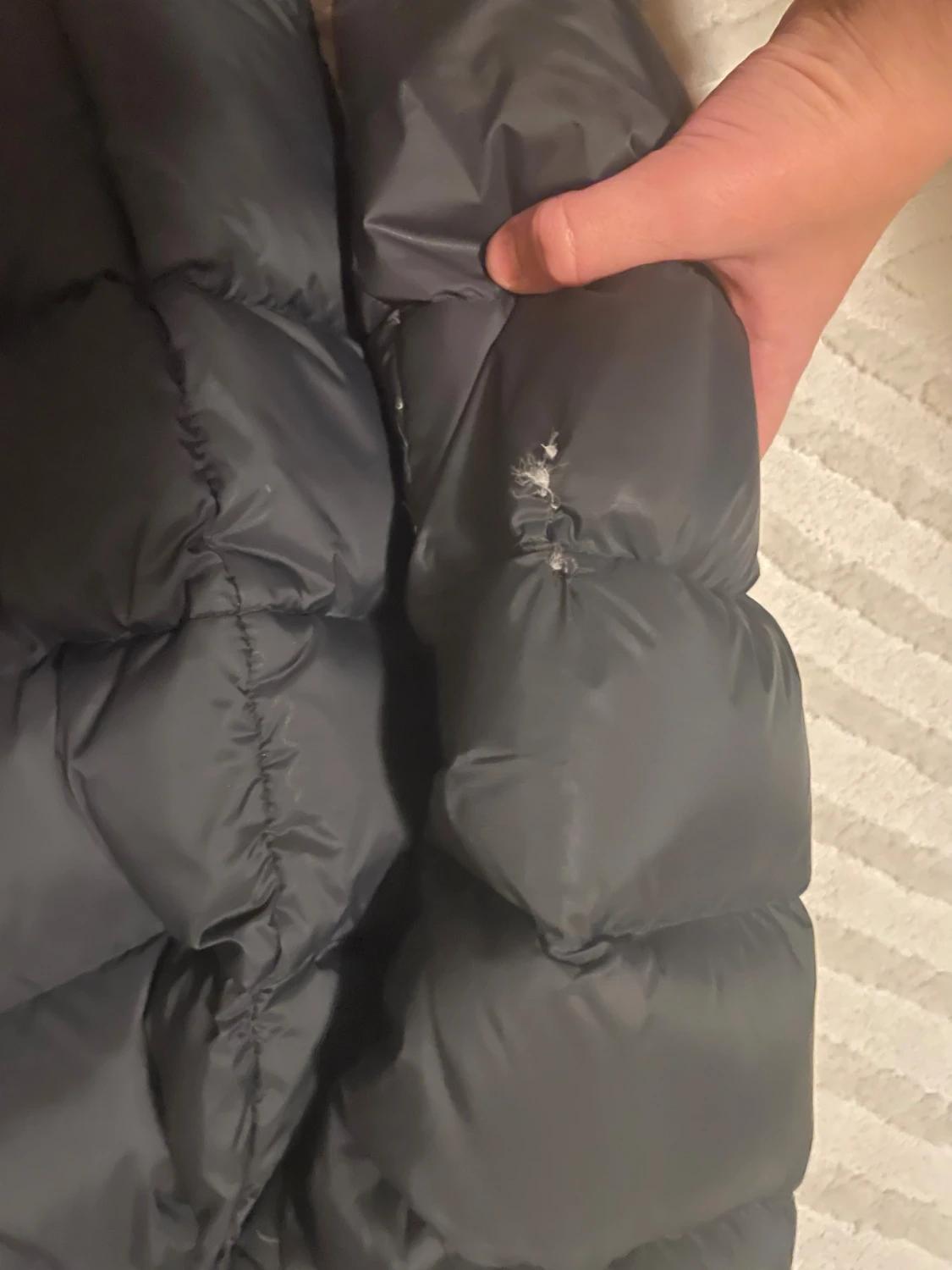 Svart dunjacka från Sail Racing - 2