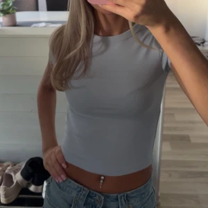 Ljusblå topp - Ljusblå topp som inte kommer till användning💙