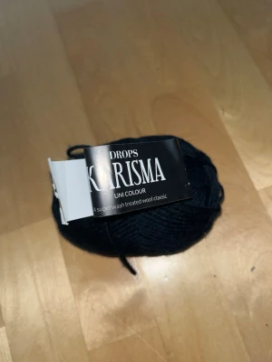 Drops Karisma - Dropsin karisma langan musta väri 05. 100% villaa.  Eläintalous MMM Katsothan myös muut ilmoitukseni Tarjoa 