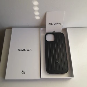 mobilskal Rimowa iphone 15 mobilcase - storlek för iphone 15, allt på bilderna ingår, förg svart, helt nytt