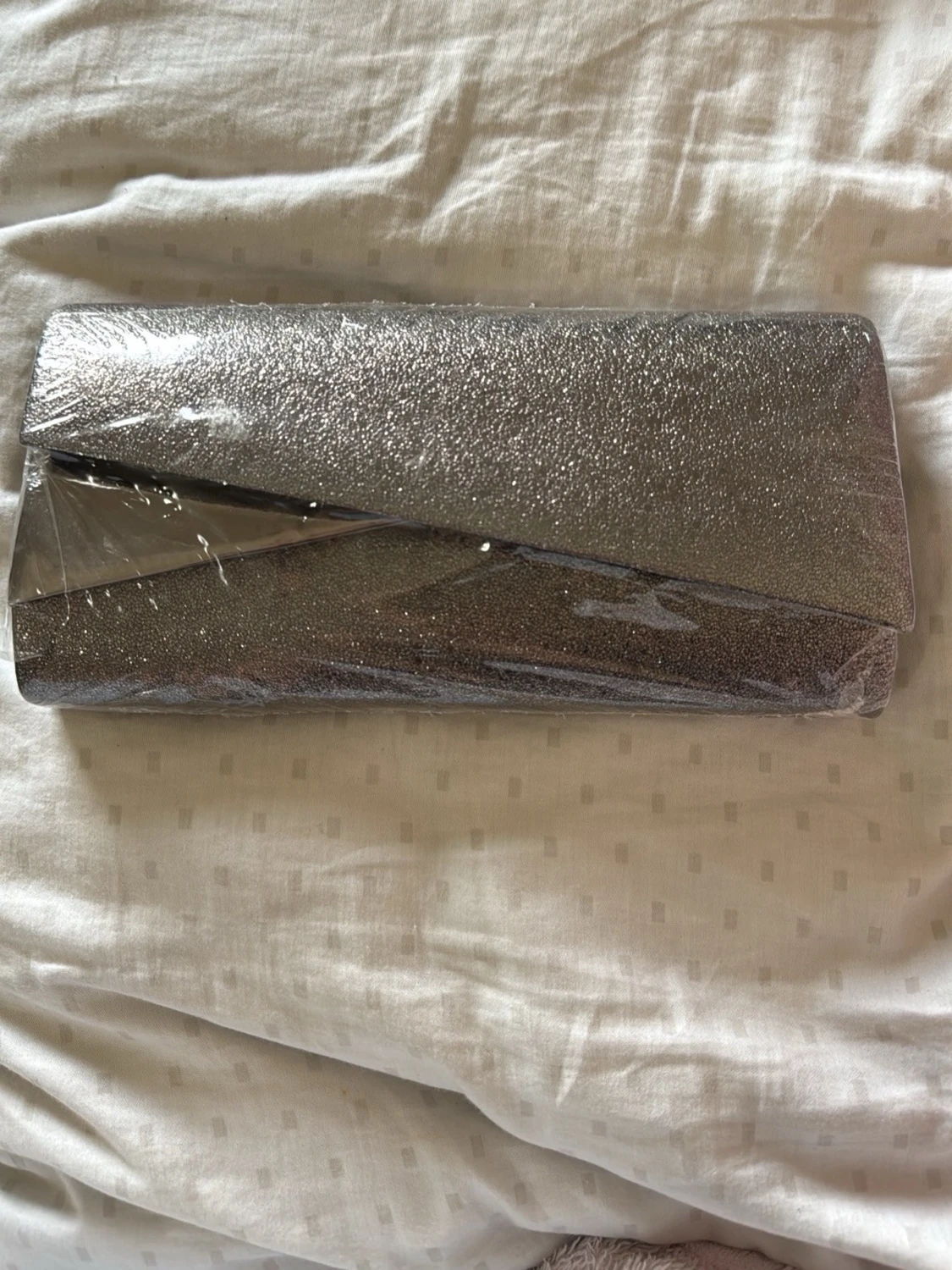 Silverfärgad glittrig kuvertväska