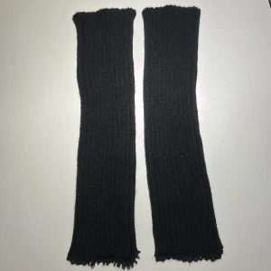 Svarta benvärmare - Svarta benvärmare köpta på blue fox.  Testade 1 gång men aldrig använda.