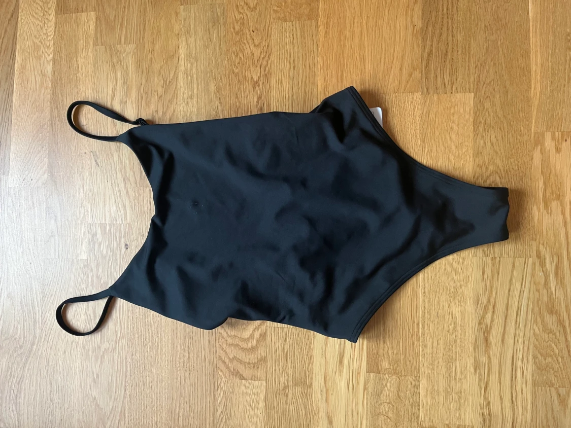 Oanvänd baddräkt xs