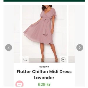 Fin sommar / dop / student / fest / bröllop / klänning / oanvänd / sl 36 - Helt ny med lappen kvar. Storlek 36.  Underbar klänning från GODDIVA. Klänningen är omlott upptill och har markerad midja som ger ett fint fall. - Resårband och knytband i midjan (avtagbart)  