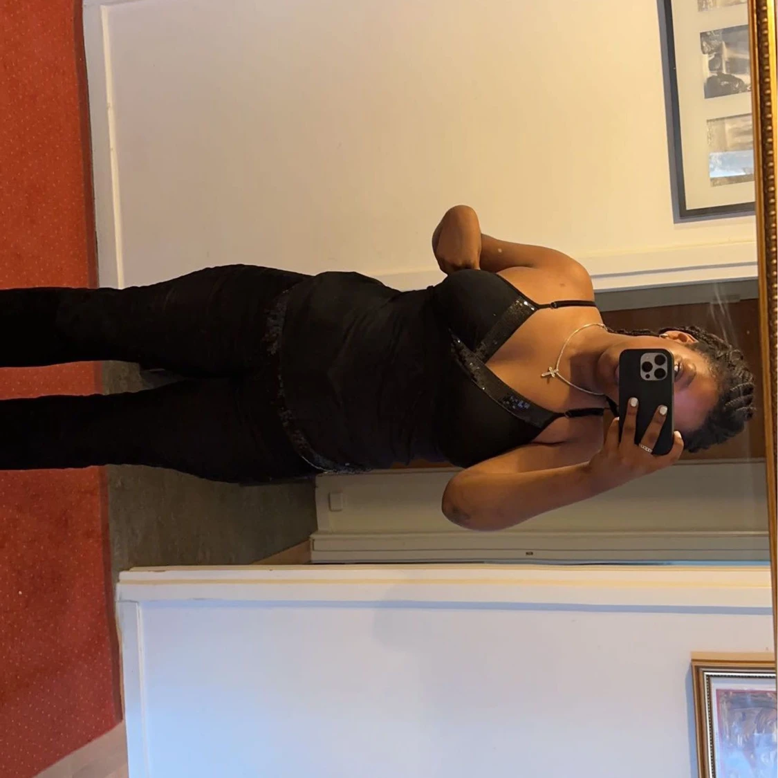 Glittrig svart top - 91