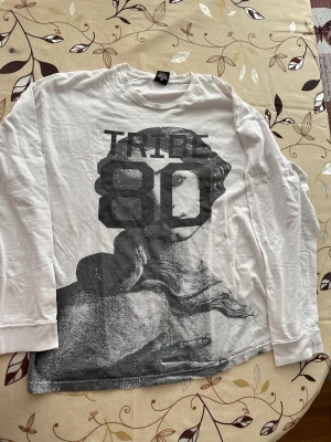 Stüssy 80 Tribe Long Sleeve T-Shirt - Comfortable, roomy, stylish Stüssy long-sleeve tee. Great condition. 100% cotton. Made in Mexico.