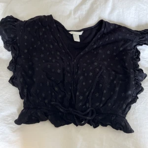 Topp - Kortare svart topp