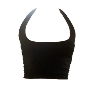 Halterneck med snörning - Supercool svart halterneck topp med snörning i bak ifrån Urban Outfitters! Aldrig använd då den inte är min stil riktigt^^ Ganska stretchig så tror den passar en xs/s/m. 