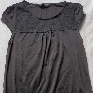 Fin svart topp  - Fint skick! Storlek 36 euro, motsvarande S.  