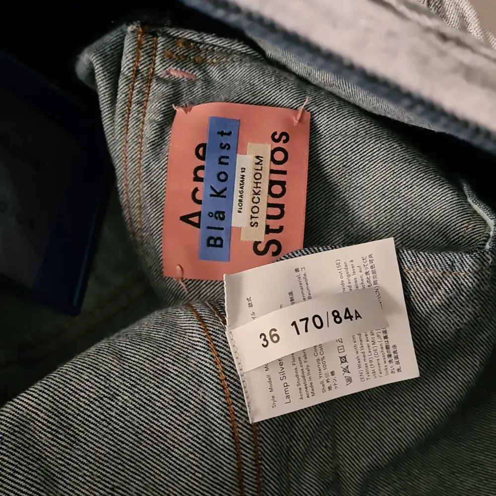 Acne Studios silver denim jacket in new condition.  Amazing silver treatment on the denim. Bought at sample sale, so there is a pen mark in the label in neck (ask for more photos, can only upload 3 here).  New condition with hang tag on. Jackor.