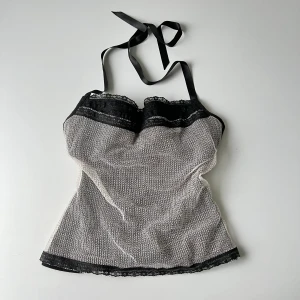 Halternecktopp - Svart topp / korsett från Intimissimi. Aldrig använd. Skickas med orginal förpackningen 💓