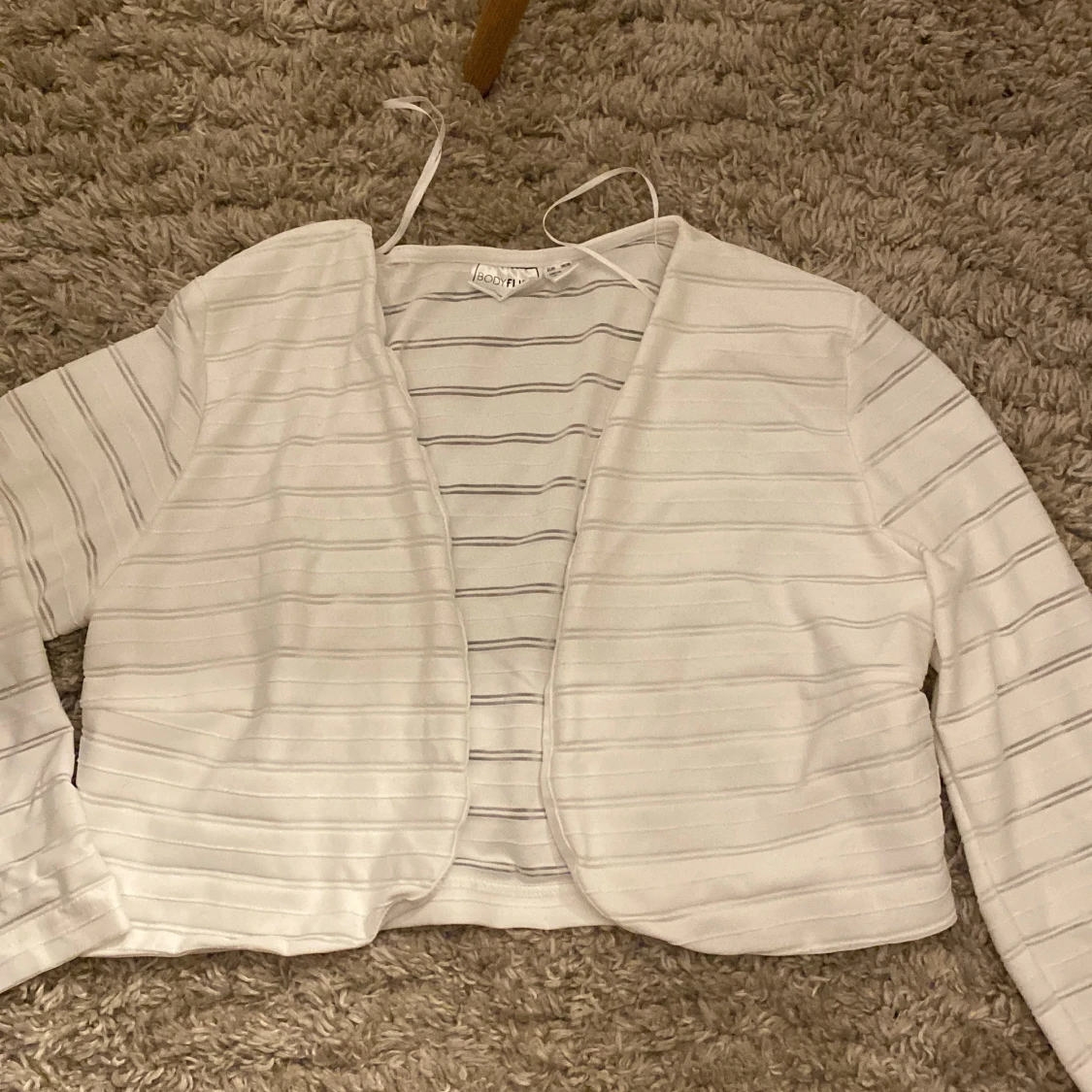 Vit randig bolero kofta