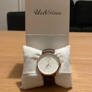 Ur&Penn klocka  - Säljer nu denna klocka då jag har en annan som jag gillar mer,använd ett fåtal gånger och har absolut inget slitage, priset går att diskuteras. 