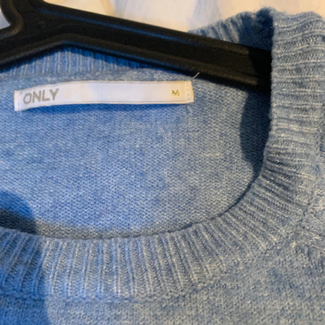 Blå stickad tröja - 90