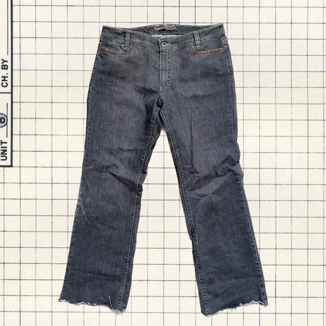 Vintage bruna utsvängda jeans med orangea pynt
