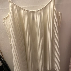 Linne  - Plisserat linne