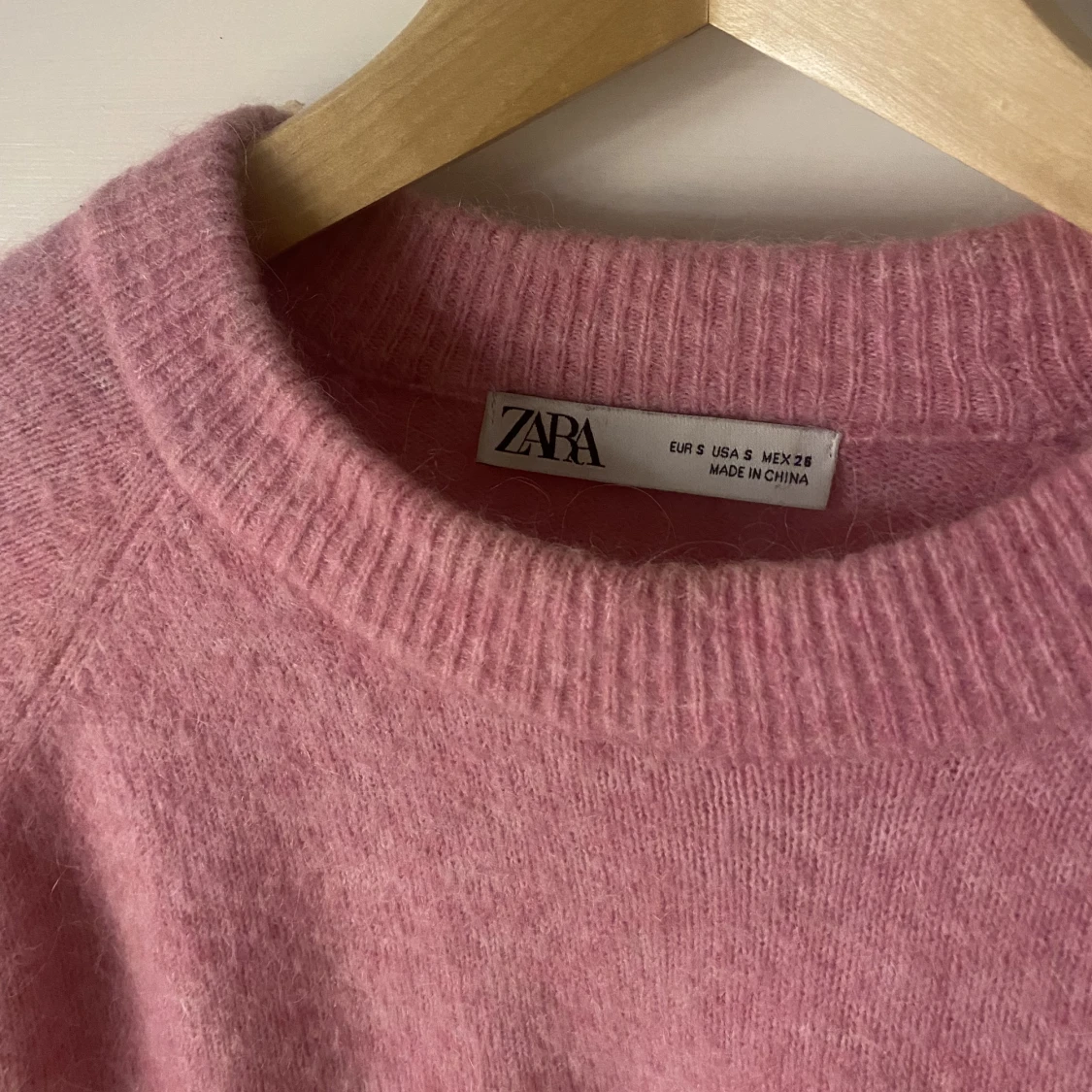 Stickad rosa tröja  - 90