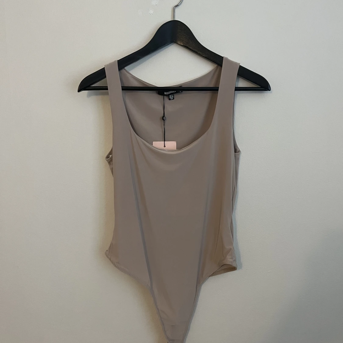 Ljusbeige bodysuit