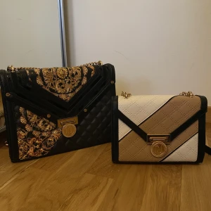 Väskor  - Aldrig använd , stora väskan för 160 , lilla 100