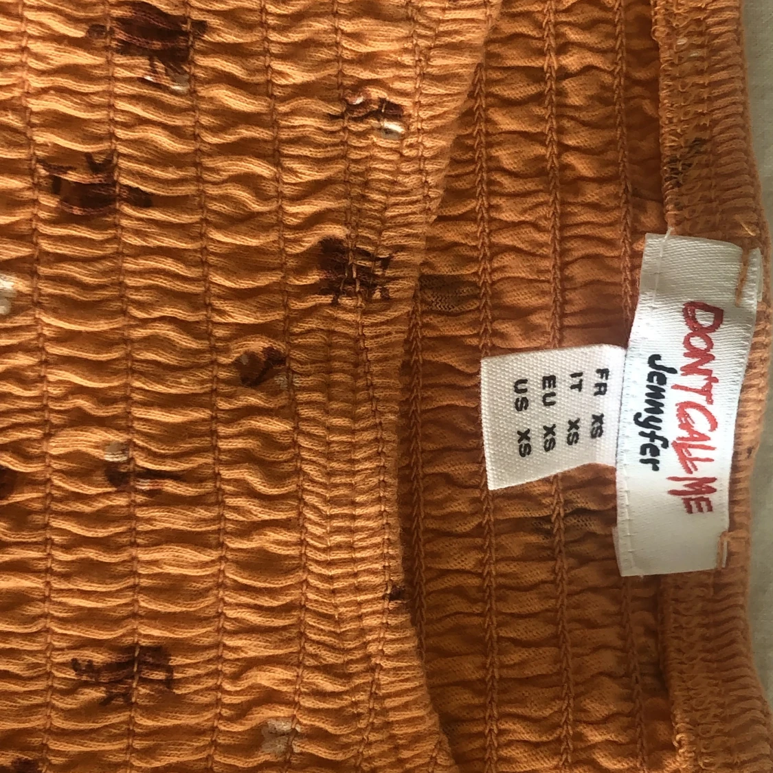 Orange blomig topp - 91