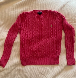 Rosa Ralph Lauren  - Ralph Lauren rosa stickad tröja, bra skick, ej blekt, 12-14 år. 