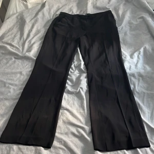 Bootcut kostymbyxor - Svarta bootcut kostymbyxor från hm