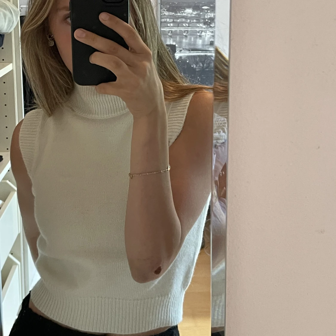 Ärmlöströja med krage