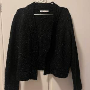 Festive cardigan from Zara.  Cool for upcoming new years parties Size is XL but it is pretty small to the sizes. I wear M usually and it fits me