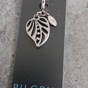 Berlock pilgrim  - Helt nytt silverfärgat 