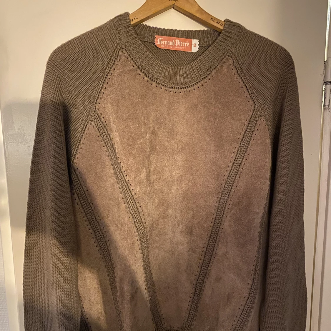 Tröja i läder och ull