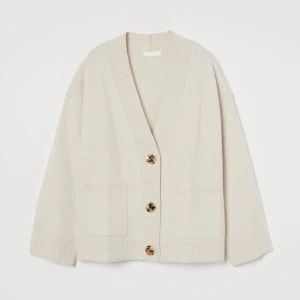 Cardigan with pockets - Super cute cardigan in a beautiful beige colour!! :) has been worn quite a lot but looks like new & has no problems. XS but can fit S and M perfectly