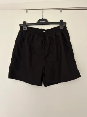 Badshorts L - Svarta badshorts storlek L