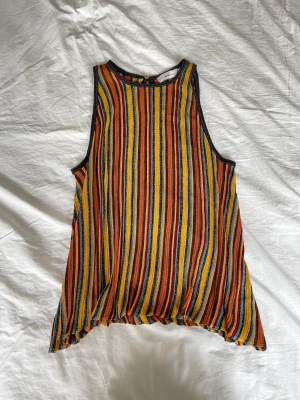 Färgglatt linne - Färgglatt randigt och glittrigt linne🧡💚💛