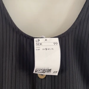 Svart body - Aa snygg svart body. Aldrig använd