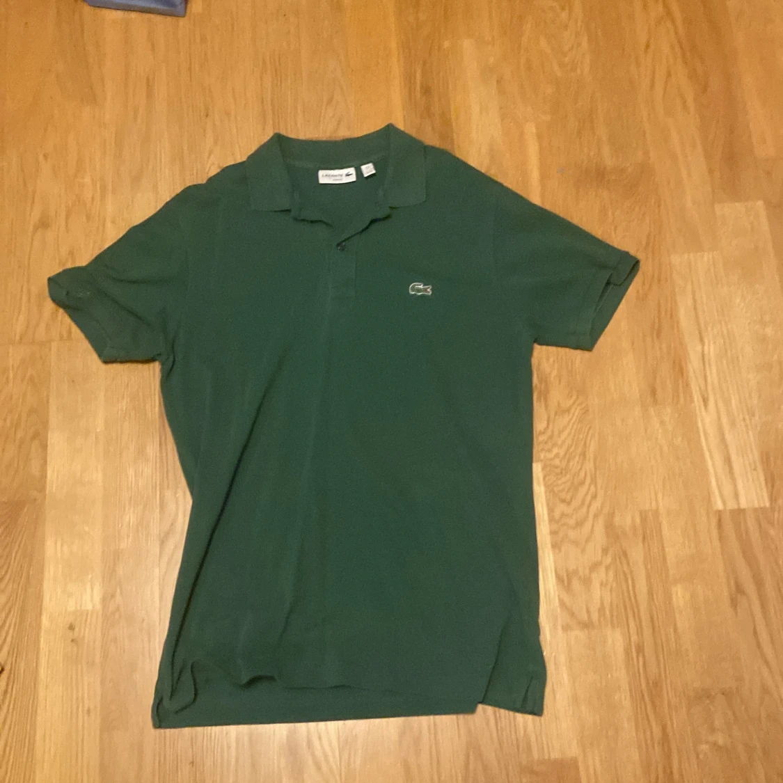 mörk grän lacoste piké