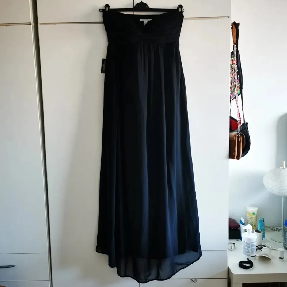 Long black dress from Nelly trend. Size 38. New with tag . Klänningar.